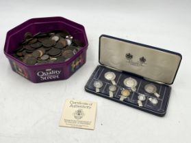 A collection of various coinage, including some silver, along with a 1976 Seychelles cased proof set