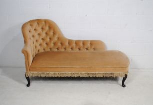 A Victorian style chaise longue, with button-back detailing, raised on carved cabriole legs - length