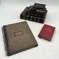 A collection of books including 'The Scripture Atlas - To Illustrate The Old and New Testament'.