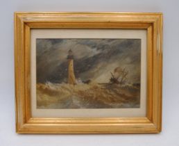 A gilt framed oil painting of a lighthouse amidst a stormy seascape, with indistinct signature to