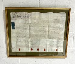 A framed indenture dated 1796 detailing the transfer of a plot of land in Middlesex. Overall size