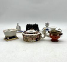 A collection of antique and vintage ink wells including crown derby, lot also includes a