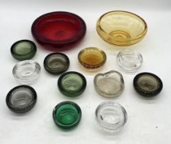 A collection of Whitefriars controlled bubble glass including large ruby red bowl