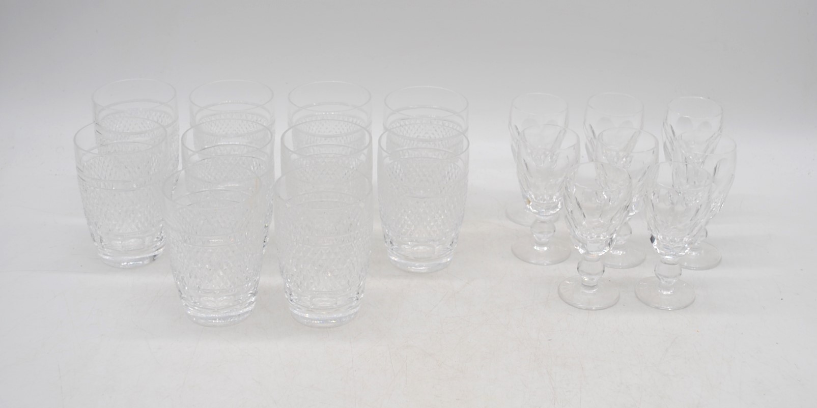 A collection of Waterford crystal glassware, comprising of ten tumblers and five sherry glasses