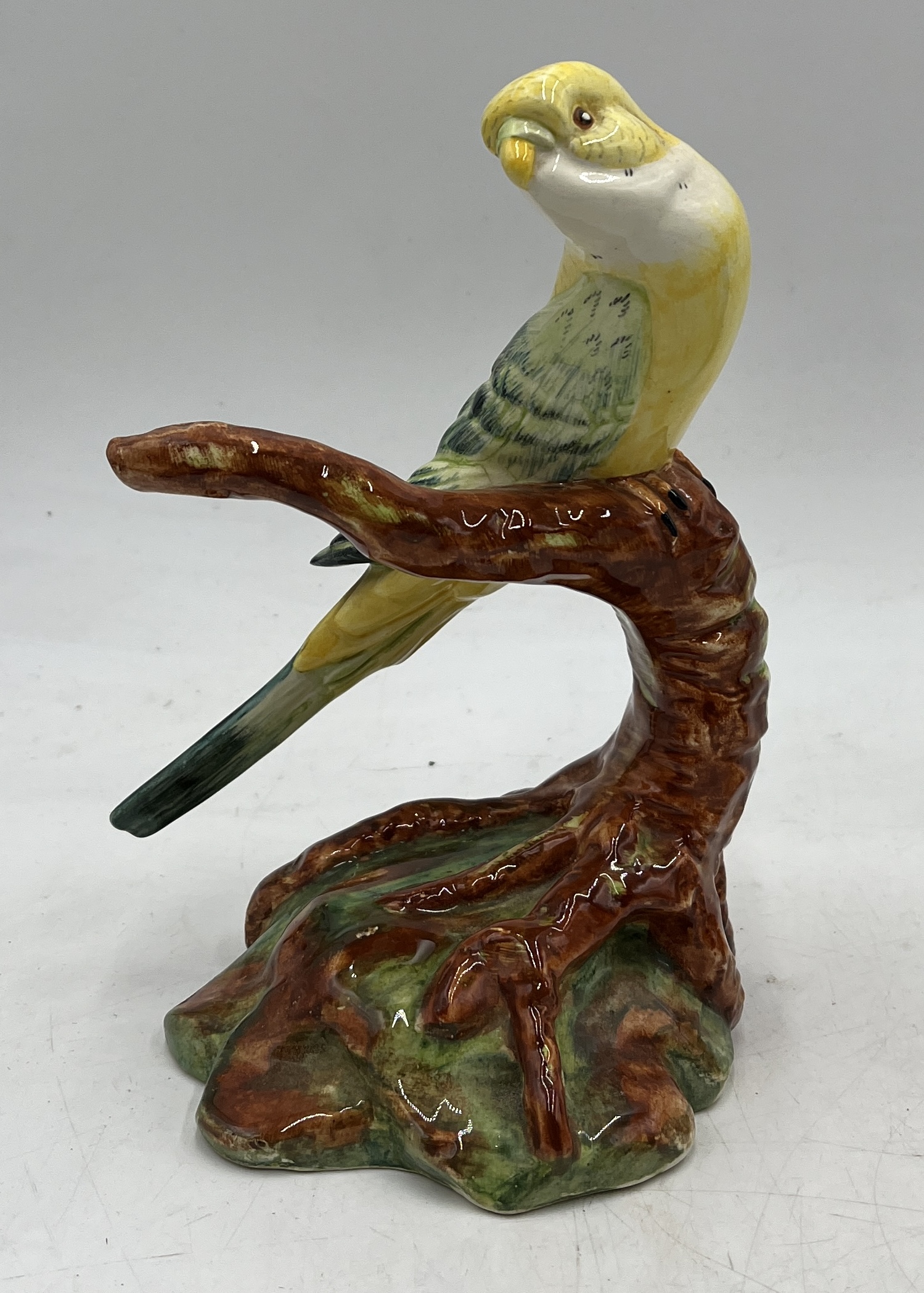 A collection of ceramics including Wade budgerigar, Sylvac spaniel, Royal Doulton Toby jugs etc. - Image 2 of 3