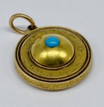 A Victorian unmarked 15ct gold (tested) mourning pendant set with turquoise and lock of hair to