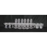 A quantity of various cut glass drinking glasses, including some Stuart crystal glass and