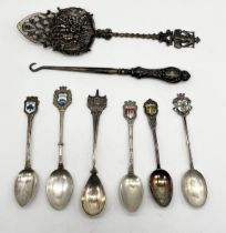 A small collection of silver spoons along with a large Dutch SCM spoons etc.