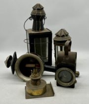 A collection of vintage lamps including Railway, carriage etc