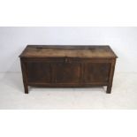 An antique oak coffer - length 138cm, depth 53cm, height 63cm