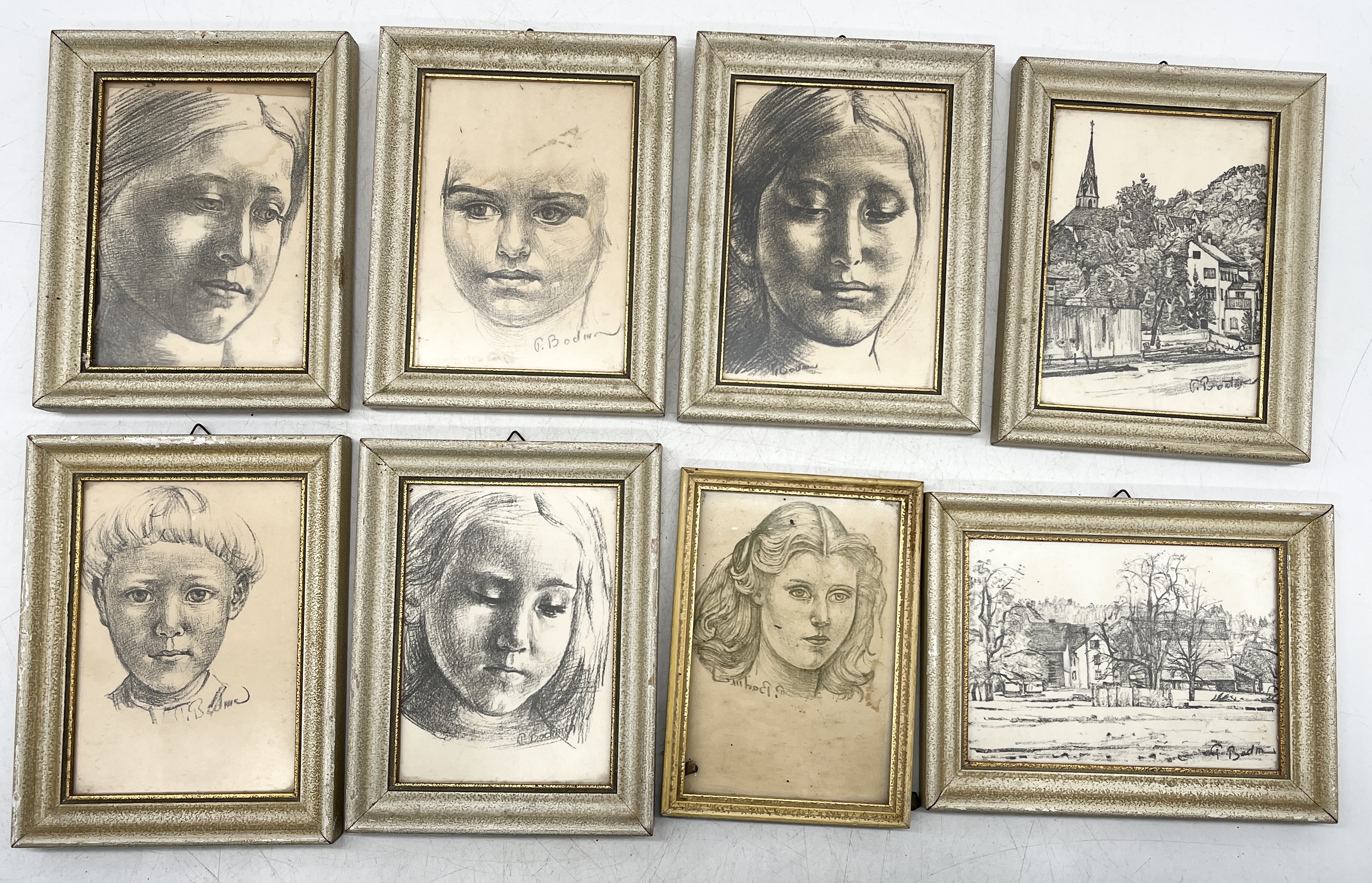 A collection of prints with indistinct signature all showing charcoal portraits, two have been out