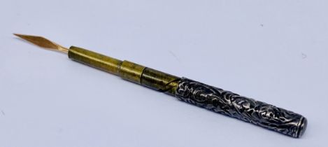 A Victorian unmarked silver extending toothpick