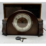 A vintage Kolster-Brandes radio along with a mantle clock