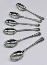 A cased set of hallmarked silver coffee spoons