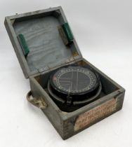 A WWI type P4A compass in a fitted wooden case