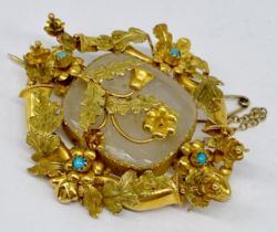 An unmarked gold (tests at least 14ct) brooch set with rock crystal and turquoise- total weight 11.