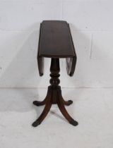 A 'Strongbow Furniture' mahogany drop-leaf occasional table, raised on splayed quad base with