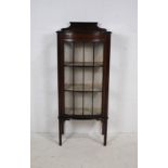 A vintage display cabinet, with beaded detailing, raised on stick legs - length 60cm, depth 36cm,