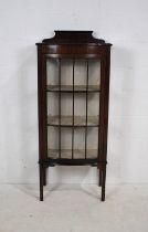 A vintage display cabinet, with beaded detailing, raised on stick legs - length 60cm, depth 36cm,
