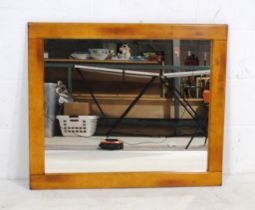 A wooden framed rectangular wall mirror - 73.5cm x 87cm