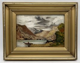 An signed oil showing a Canadian mountainous lake scene with figure to the foreground in a canoe,