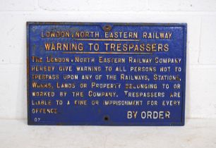 A painted cast iron sign for London North Eastern Railway - 'Warning To Trespassers' - length 66.