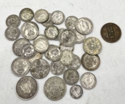 A collection of various silver and part silver coinage including 1818 sixpence, 1896 half crown etc.