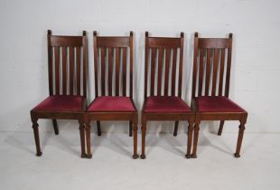 A set of four turn of the century oak dining chairs, with splayed spade feet