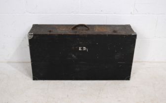 An antique wooden carpenters tool box and contents, with initials 'E.D' to drop-down front revealing