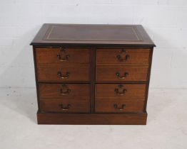 A mahogany chest of four lockable filing drawers (with keys), with brown leather inset top -