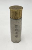 A Pewter hipflask modelled as a Purdey shotgun cartridge