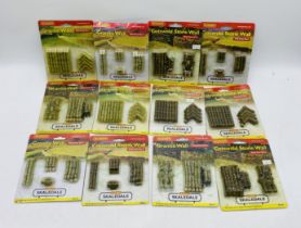 A collection of Hornby Skaledale OO gauge Cotswold stone & granite wall packs - twelve packs in