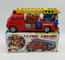 A vintage boxed Kokyu friction powered F.9 fire engine with siren - (No. K1842)