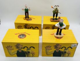 Four boxed Coalport Characters Wallace & Gromit ceramic figurines including "Cracking Toast Gromit",