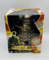 A boxed Character Options Ltd Doctor Who Radio Controlled Dalek in bronze - unopened (Item No