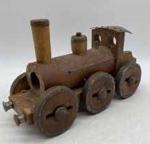 A hand built wooden train made from bobbins etc. length 31.5cm