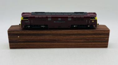 A boxed Liliput OO gauge "Western Sovereign" diesel locomotive (D1038) in maroon livery