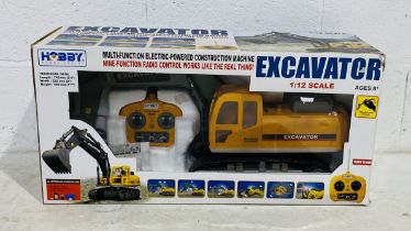 A boxed Hobby Engine radio control Tracked Excavator - no charger (1:12 Scale)