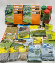 A collection of model railway scenery accessories including six boxes of Gaugemaster grey