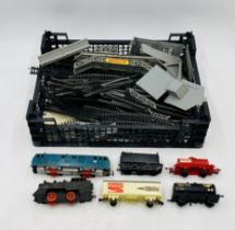 A collection of OO gauge model railway including a Lima locomotive, rolling stock and collection