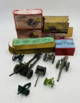 A collection of die-cast artillery guns including Britains Gun of the Royal Artillery, two boxed