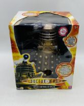 A boxed Character Options Ltd Doctor Who Radio Controlled Dalek in bronze (Item No 01629 - Dalek