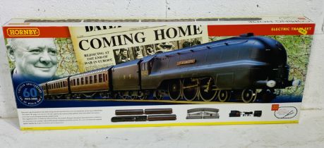 A boxed Hornby OO gauge "Coming Home" electric train set marking the 60th Anniversary end of WW2 (