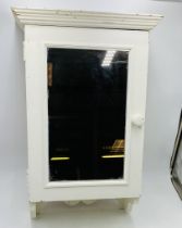 A pine white-painted wall hanging cupboard with mirrored door - height 65cm, width 42cm