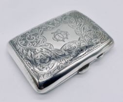 A hallmarked silver curved cigarette case