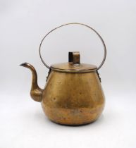 An antique brass kettle - total height 36cm