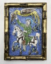 A gilt framed Persian style pottery tile with figure of a horse on blue background