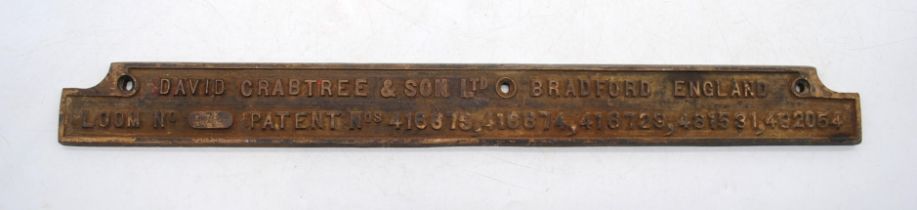 An antique bronze loom sign reading 'David Crabtree & Son Ltd, Bradford, England - Loom No. 278,