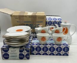 A boxed mid-century style Thomas (Germany) coffee set with orange motif.