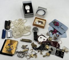 A collection of costume jewellery, watches, compact, lighters etc.